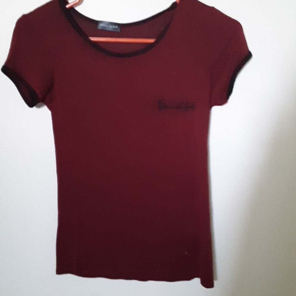 A maroon t shirt from urban episode